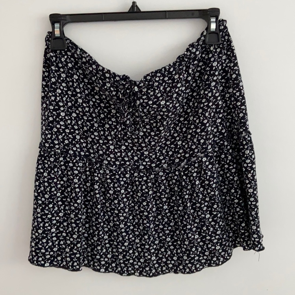 blue and white flower patterned skirt
